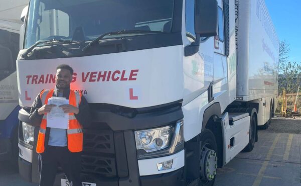 Nilton celebrating passing his Category CE 3b HGV test at MT Training Manchester