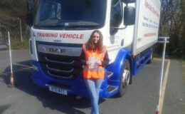 Amber celebrating after passing her Category C 3a HGV test at MT Training’s Plymouth centre