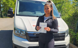 Olivia holding her C1 3b pass certificate at MT Training’s Tewkesbury Training Centre