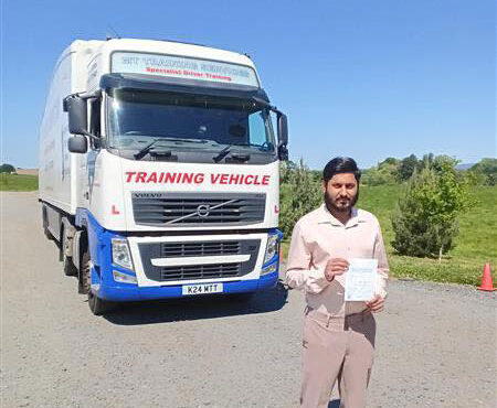 Usama celebrating his clean sheet CE 3b HGV test pass at MT Training Birmingham