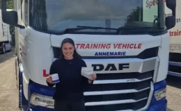 Annabel holding her CE 3b pass certificate at MT Training’s Tewkesbury centre after a successful HGV test