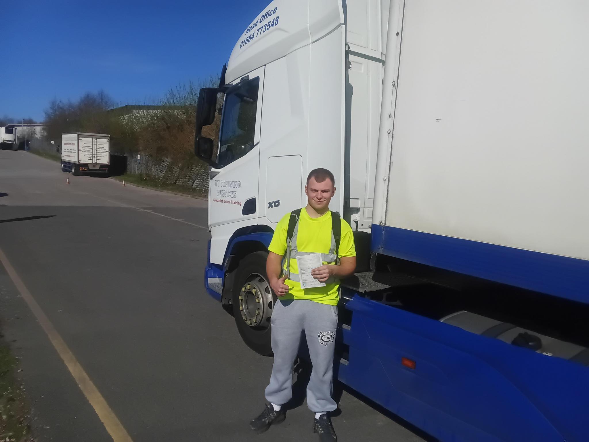 Trainee driver Christopher after passing his CE 3a manoeuvring test during HGV training in Plymouth with MT Training Services