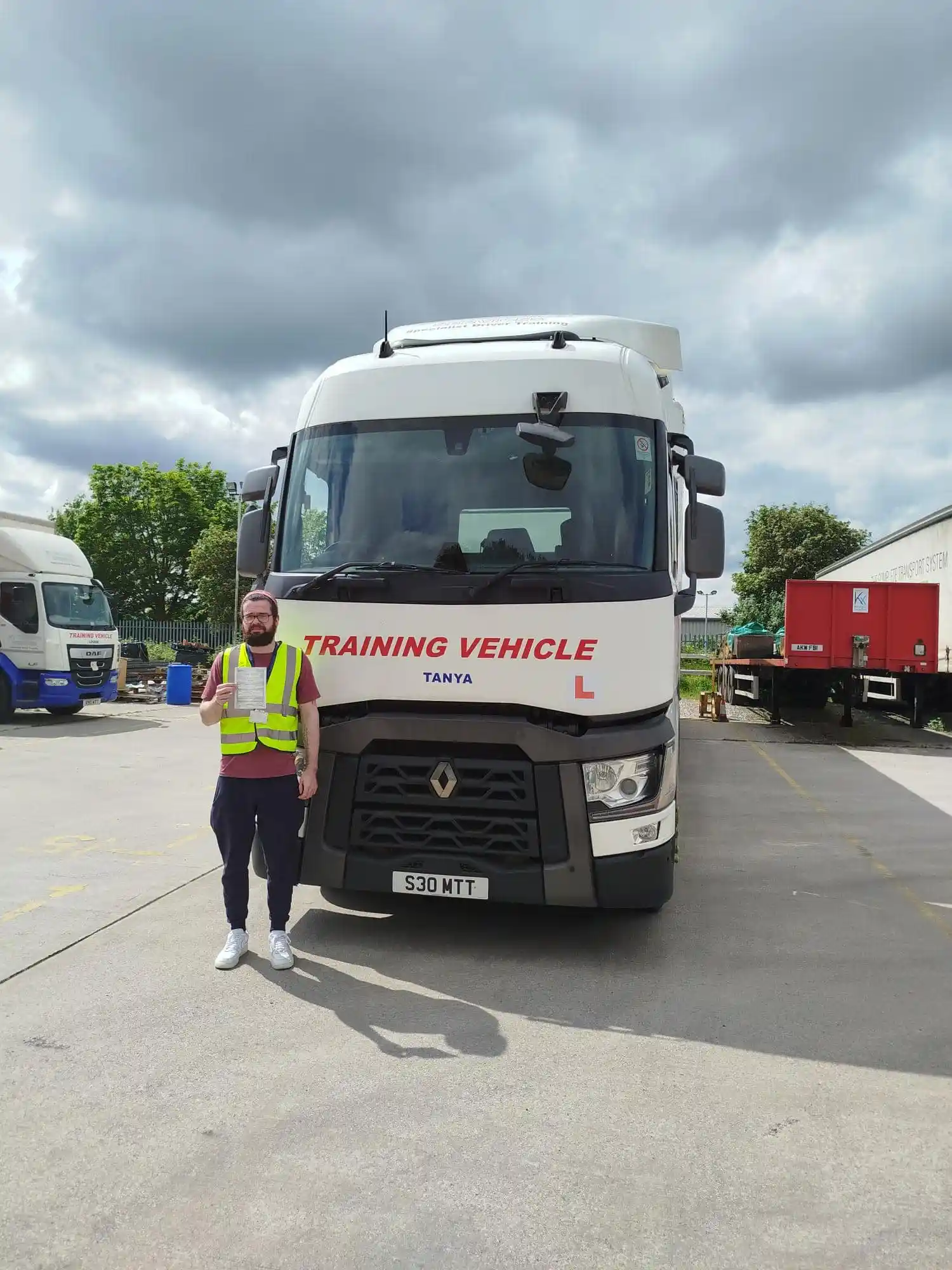 Logan celebrates passing his HGV 3a test at MT Training’s Manchester training centre